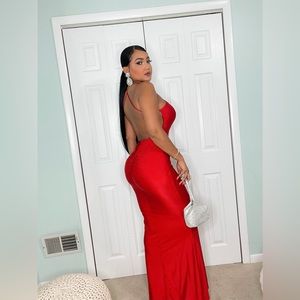 It is a maxi dress, red color, the size is S.